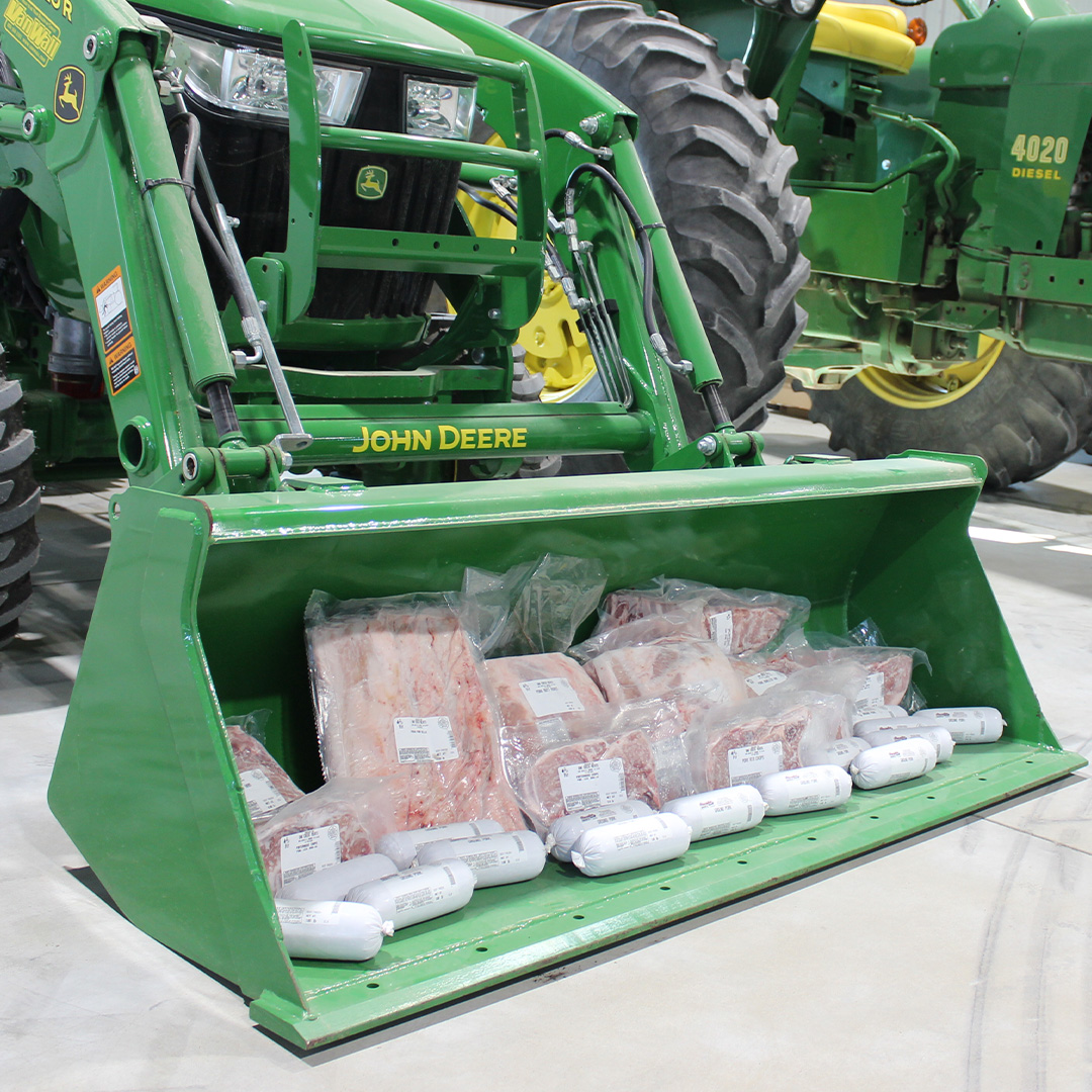 Oak Creek Meats in Tractor Bucket
